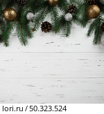 christmas composition green fir tree branches. Стоковое фото, агентство Ingram Publishing / Фотобанк Лори