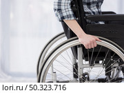 close up invalid person wheelchair. Стоковое фото, агентство Ingram Publishing / Фотобанк Лори