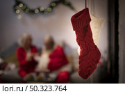 close up red white christmas socks. Стоковое фото, агентство Ingram Publishing / Фотобанк Лори