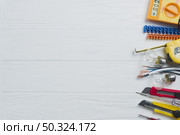 electrical tools equipment white table. Стоковое фото, агентство Ingram Publishing / Фотобанк Лори