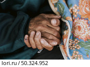 homeless man holding his hands with blanket. Стоковое фото, агентство Ingram Publishing / Фотобанк Лори