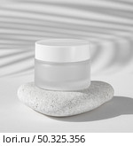 skin care moisture recipient on a white rock . Resolution and high quality beautiful photo. skin care moisture recipient on a white rock . High quality and resolution beautiful photo concept. Стоковое фото, агентство Ingram Publishing / Фотобанк Лори