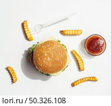 flat lay burger with fries ketchup. Resolution and high quality beautiful photo. flat lay burger with fries ketchup. High quality beautiful photo concept. Стоковое фото, агентство Ingram Publishing / Фотобанк Лори