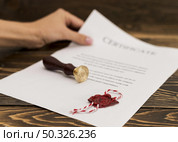 graduation diploma certificate wax seal. Resolution and high quality beautiful photo. graduation diploma certificate wax seal. High quality beautiful photo concept. Стоковое фото, агентство Ingram Publishing / Фотобанк Лори
