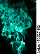 fluffy puffs green smoke fog black background. High resolution photo. fluffy puffs green smoke fog black background. High quality photo. Стоковое фото, агентство Ingram Publishing / Фотобанк Лори