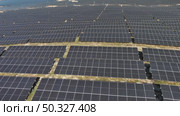 Aerial view of solar power station. Стоковое видео, видеограф Михаил Коханчиков / Фотобанк Лори