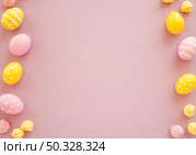 colourful easter eggs with small sweets table. High resolution photo. colourful easter eggs with small sweets table. High quality photo. Стоковое фото, агентство Ingram Publishing / Фотобанк Лори