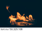 abstract fire flames black backdrop. High resolution photo. abstract fire flames black backdrop. High quality photo. Стоковое фото, агентство Ingram Publishing / Фотобанк Лори