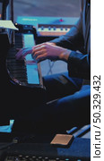 The musician's hands quickly press the keys of the piano. The pianist plays the instrument masterfully. A classical music concert. Close-up. Стоковое видео, видеограф Воловодов Владимир / Фотобанк Лори