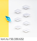 creative arrangement individuality concept paper boats. High resolution photo. creative arrangement individuality concept paper boats. High quality photo. Стоковое фото, агентство Ingram Publishing / Фотобанк Лори