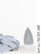 front view clothing iron clothes. High resolution photo. front view clothing iron clothes. High quality photo. Стоковое фото, агентство Ingram Publishing / Фотобанк Лори