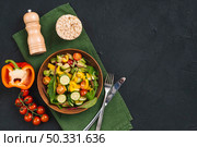 rice puffed cake vegetables salad pepper shakers napkin black concrete textured backdrop. High resolution photo. rice puffed cake vegetables salad pepper shakers napkin black concrete textured backdrop. High quality photo. Стоковое фото, агентство Ingram Publishing / Фотобанк Лори