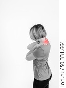 sporty woman sore neck. High resolution photo. sporty woman sore neck. High quality photo. Стоковое фото, агентство Ingram Publishing / Фотобанк Лори