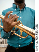african american man playing music jazz day. Стоковое фото, агентство Ingram Publishing / Фотобанк Лори