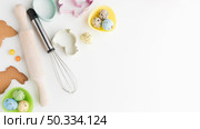 top view colorful eggs kitchen utensils with copy space. Стоковое фото, агентство Ingram Publishing / Фотобанк Лори
