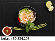top view noodles bowl with asparagus. Стоковое фото, агентство Ingram Publishing / Фотобанк Лори