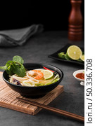 high angle soup with noodles chopsticks. Стоковое фото, агентство Ingram Publishing / Фотобанк Лори