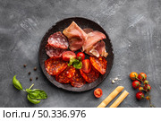 top view salami arrangement plate. Стоковое фото, агентство Ingram Publishing / Фотобанк Лори