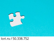 white single puzzle piece blue background. Стоковое фото, агентство Ingram Publishing / Фотобанк Лори