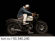 man cafe racer style motorbike_2. Стоковое фото, агентство Ingram Publishing / Фотобанк Лори