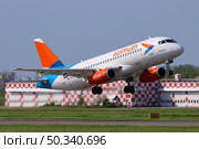 Сухой Суперджет SSJ-100 авиакомпании "Азимут" Редакционное фото, фотограф Александр Тарасенков / Фотобанк Лори