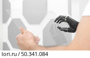 close up man with hand prototype. Стоковое фото, агентство Ingram Publishing / Фотобанк Лори