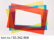 colorful red yellow blue tilt border frame white background. Стоковое фото, агентство Ingram Publishing / Фотобанк Лори