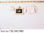 child clothes ultrasonic picture. Стоковое фото, агентство Ingram Publishing / Фотобанк Лори