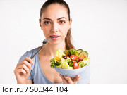 close up portrait woman holding salad. Стоковое фото, агентство Ingram Publishing / Фотобанк Лори
