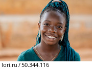 close up smiley african girl. Стоковое фото, агентство Ingram Publishing / Фотобанк Лори