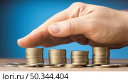 finances arrangement with bunch coins. Стоковое фото, агентство Ingram Publishing / Фотобанк Лори