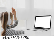 school girl attending online classes. Стоковое фото, агентство Ingram Publishing / Фотобанк Лори