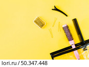 combs hairpins near cosmetics bag. Стоковое фото, агентство Ingram Publishing / Фотобанк Лори