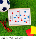 football composition with white tactic board. Стоковое фото, агентство Ingram Publishing / Фотобанк Лори