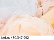 high angle view messy fabrics. Стоковое фото, агентство Ingram Publishing / Фотобанк Лори