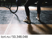 leg view woman with rope. Стоковое фото, агентство Ingram Publishing / Фотобанк Лори