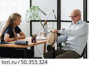 smiley senior man nursing home with nurse. Стоковое фото, агентство Ingram Publishing / Фотобанк Лори