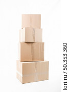 stacked cardboard boxes isolated white background. Стоковое фото, агентство Ingram Publishing / Фотобанк Лори