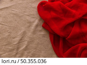 smooth red textile brown fabric background. Стоковое фото, агентство Ingram Publishing / Фотобанк Лори