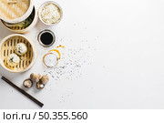 baozi near soy sauce noodles. Стоковое фото, агентство Ingram Publishing / Фотобанк Лори