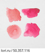 set different tones red paints white paper. Стоковое фото, агентство Ingram Publishing / Фотобанк Лори