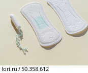 high view various sanitary napkins tampon. Стоковое фото, агентство Ingram Publishing / Фотобанк Лори