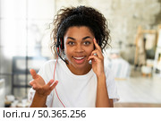woman with headset working from home. Стоковое фото, агентство Ingram Publishing / Фотобанк Лори