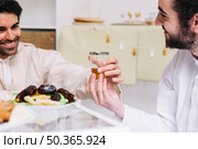 eid al fitr concept with tea glass dates. Стоковое фото, агентство Ingram Publishing / Фотобанк Лори