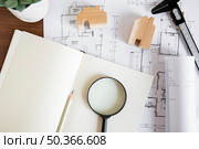notebook near drafts house figures. Стоковое фото, агентство Ingram Publishing / Фотобанк Лори