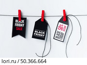pack hanging tags plain background. Стоковое фото, агентство Ingram Publishing / Фотобанк Лори