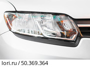 stylish headlight silver automobile. Стоковое фото, агентство Ingram Publishing / Фотобанк Лори