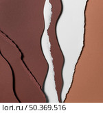 torn layers brown white paper. Стоковое фото, агентство Ingram Publishing / Фотобанк Лори