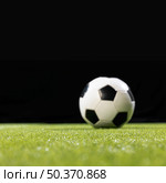 close up soccer ball pitch. Стоковое фото, агентство Ingram Publishing / Фотобанк Лори