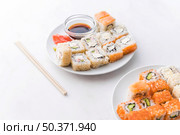 assortments sushi with sauce chopsticks. Стоковое фото, агентство Ingram Publishing / Фотобанк Лори